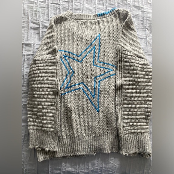 sweater with unique star embroidery on back and front with stitching on collar. - Picture 2 of 3